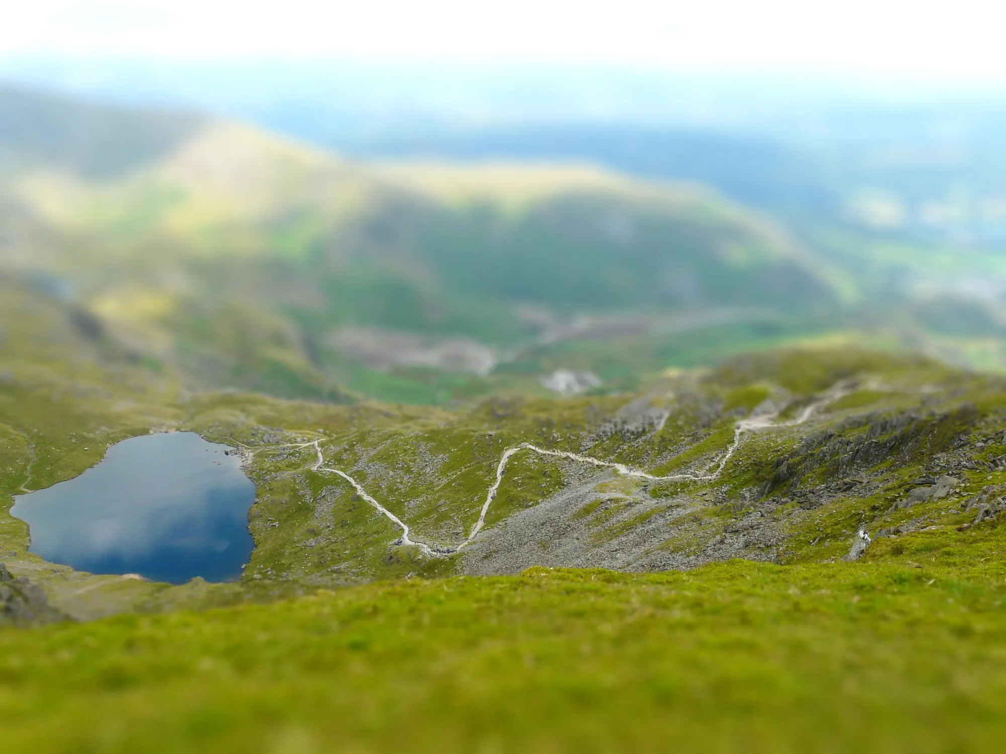 A miniature-effect view down from the Old Man of Coniston